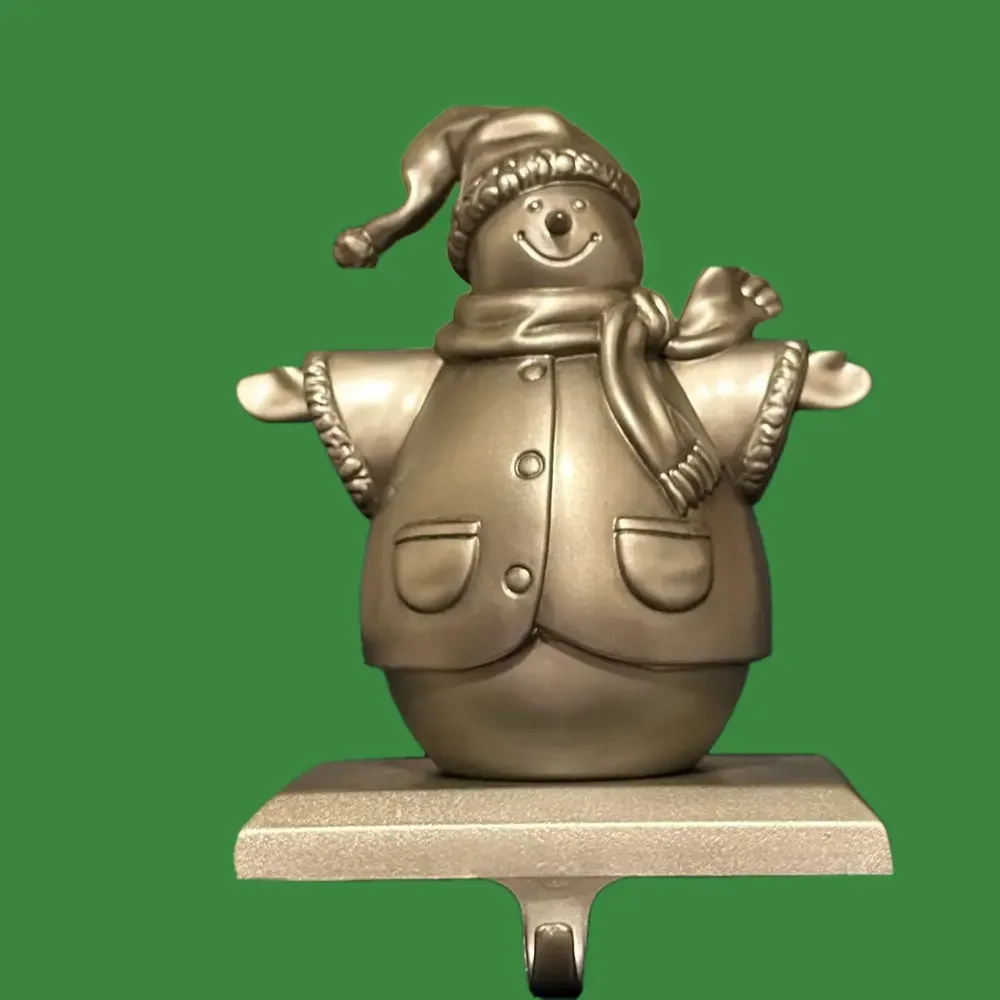 Silver snowman stocking holder. So cute!